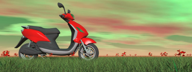Red electric scooter parked on grass with a colorful sky, relevant to DUI laws for electric scooters.