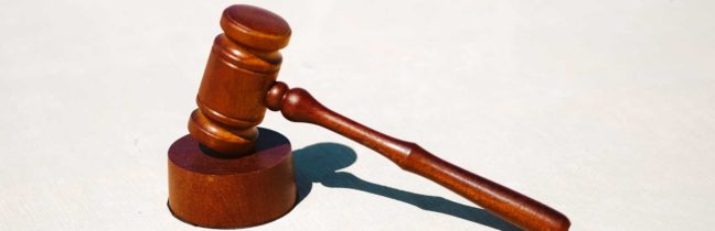 Gavel on a wooden block symbolizing justice and legal proceedings related to DUI laws and criminal defense.